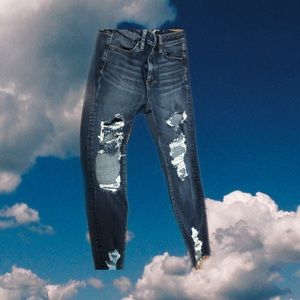 Dark blue ripped jeans